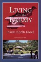 Living With the Enemy: Inside North Korea 1565912349 Book Cover
