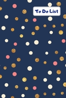 To do list: 100 page to do list with tick box to check when task has been completed. Handy 6x9 size. Navy design with red, white & gold spots 1672809568 Book Cover
