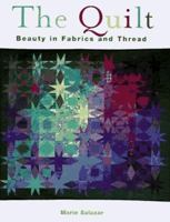 The Quilt: Beauty in Fabric and Thread 1567994741 Book Cover