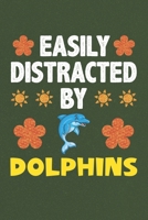 Easily Distracted By Dolphins: Dolphins Lovers Funny Gifts Dot Grid Journal Notebook 6x9 120 Pages 1678885630 Book Cover