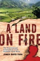 A Land On Fire: The Environmental Consequences of the Southeast Asian Boom 0813342678 Book Cover