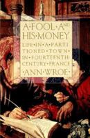 A Fool and his Money: Life in a Partitioned Town in Fourteenth-Century France 0809045958 Book Cover