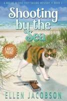Shooting by the Sea: Large Print Edition (A Mollie McGhie Cozy Sailing Mystery) 195149511X Book Cover