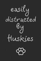 Easily distracted by Huskies: novelty notebook for Husky lovers 6"x9" 1712555154 Book Cover