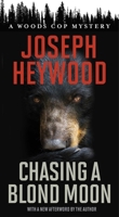 Chasing A Blond Moon: A Woods Cop Mystery 1493059157 Book Cover