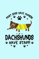 Most Dogs Have Owners Dachshunds Have Staff: Journal Cute Winers Sarcasm Fun Quote Notebook for Kids Student College Doxies Lovers Back to school Gift for Writing ideas Taking Notes Personal Use 1697305083 Book Cover