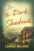 In The Dark Shadows (Mountain Shadows Mystery Series) 1738117936 Book Cover