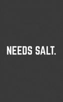 Needs Salt: Needs Salt Notebook - Funny Doodle Diary Book Gift For Chef, Cooking Fans, Foodies Who Love To Cook And Eat! Sarcastic Saying For Culinary School Student Or Teacher, Restaurant Critic And  1070116580 Book Cover