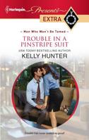 Trouble in a Pinstripe Suit 0373528590 Book Cover