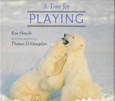 A Time for Playing (A How Animals Live Book) 0525651594 Book Cover
