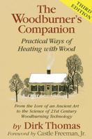 The Woodburner's Companion: Practical Ways of Heating with Wood 0911469281 Book Cover