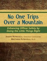 No One Trips Over A Mountain 1932777776 Book Cover