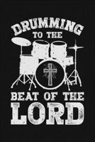 Drumming To The Beat of The Lord: Drummer Lined Notebook, Journal, Organizer, Diary, Composition Notebook, Gifts for Drummers and Music Lovers 1709832983 Book Cover