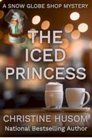 The Iced Princess: A Snow Globe Shop Mystery 1948068206 Book Cover