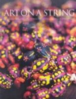 Art on a String: Aboriginal Threaded Objects from the Central Desert and Arnhem Land 0957818068 Book Cover