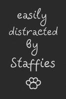 Easily distracted by Staffies: novelty notebook for Staffie lovers 6"x9" 1712532391 Book Cover