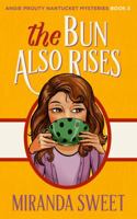 The Bun Also Rises: A Cozy Mystery Novel 0999437348 Book Cover