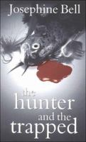 The Hunter and the Trapped 0754085627 Book Cover