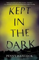Kept in the dark 0452298334 Book Cover