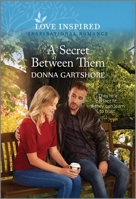 A Secret Between Them: An Uplifting Inspirational Romance 1335597352 Book Cover