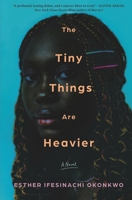The Tiny Things Are Heavier 1639734104 Book Cover