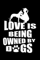 Love is Being Owned By Dogs: Journal Notebook Gift for Dog and Puppy Lovers 1697376010 Book Cover