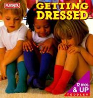 Getting Dressed: Tab Board Book 0525460195 Book Cover