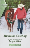 Mistletoe Cowboy: A Clean Romance 1335889965 Book Cover