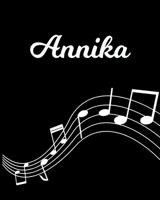 Annika: Sheet Music Note Manuscript Notebook Paper - Personalized Custom First Name Initial A - Musician Composer Instrument Composition Book - 12 Staves a Page Staff Line Notepad Notation Guide - Cre 1703870417 Book Cover