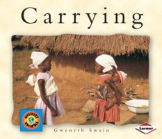 Carrying (English-Arabic) (Small World series) 1575052598 Book Cover