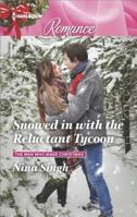 Snowed In with the Reluctant Tycoon 0373744609 Book Cover