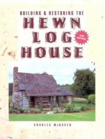 Building and Restoring the Hewn Log House 155870325X Book Cover