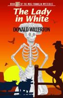 The Lady in White: Book 7 of the Mogi Franklin Mysteries 1938288432 Book Cover