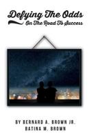 Defying the Odds: On the Road to Success 1522756450 Book Cover