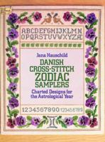Danish Cross-Stitch Zodiac Samplers: Charted Designs for the Astrological Year (Dover Needlework) 0486240320 Book Cover