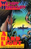 A Hard Light: A Maggie MacGowen Mystery 0525940677 Book Cover