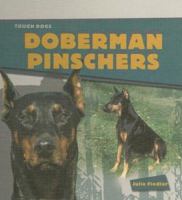 Doberman Pinschers (Fiedler, Julie. Tough Dogs.) 140423120X Book Cover