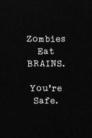 Zombies Eat BRAINS. You're Safe.: Funny Office CoWorker Notebook : Blank Lined Interior 1697164455 Book Cover