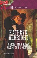 Christmas Kiss from the Sheriff 0373299079 Book Cover