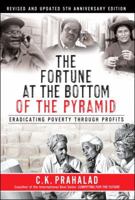 The Fortune at the Bottom of the Pyramid: Eradicating Poverty Through Profits (The Wharton Press Paperback Series) 0131877291 Book Cover