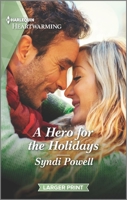A Hero for the Holidays: A Clean Romance 1335889914 Book Cover