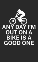 Any day Im out on a bike is a good one: Mountain bike notebook for mountain bikers with spell. 120 pages lined. Perfect gift. 1710015209 Book Cover
