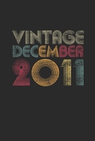Vintage December 2011: Graph Paper Notebook - 8 years old Birthday Gift or 8th Anniversary Gift Idea 1711964174 Book Cover