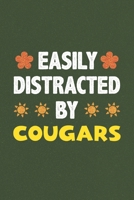 Easily Distracted By Cougars: Cougars Lovers Funny Gifts Dot Grid Journal Notebook 6x9 120 Pages 1679320947 Book Cover