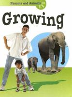 Growing (Humans and Animals) 1583406905 Book Cover