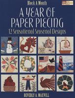 A Year of Paper Piecing: 12 Sensational Seasonal Designs 1564778142 Book Cover