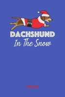 Dachshund In The Snow: Dachshund Gift Notebook for Doxie Dog and Puppy Lovers 170027323X Book Cover