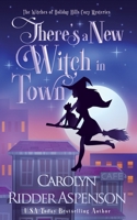 There's a New Witch in Town Christmas Edition (The Witches of Holiday Hills Cozy Mystery Series) B0CN4GGPLM Book Cover