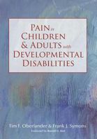 Pain in Children and Adults with Developmental Disabilities 1557668698 Book Cover