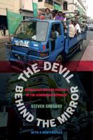 The Devil behind the Mirror: Globalization and Politics in the Dominican Republic 0520249291 Book Cover